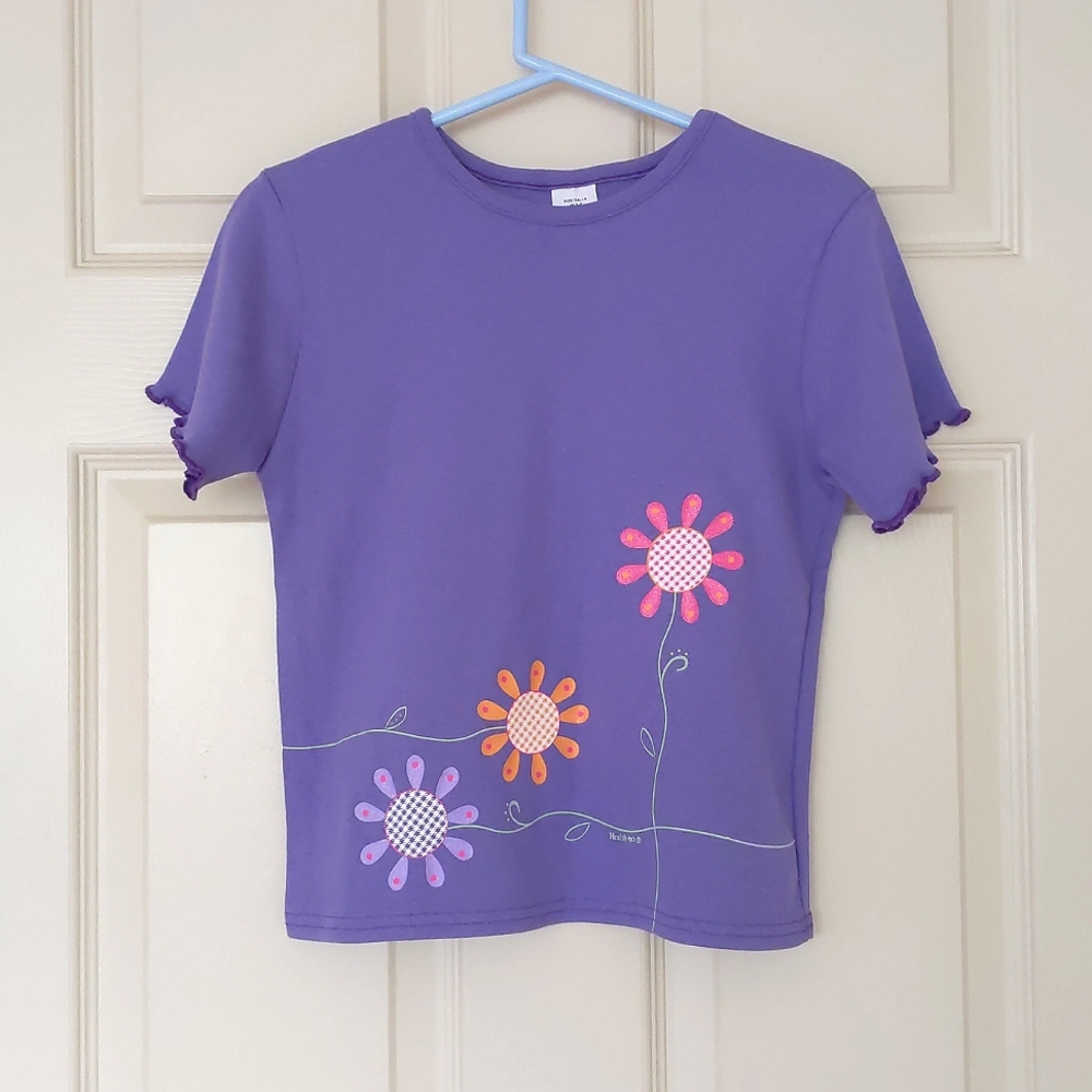 NWOT. 100% Cotton Short Sleeve Tee with multi color painted flowers and design.